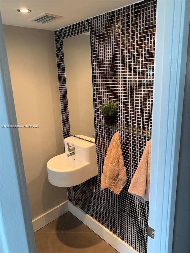 bathroom featuring tile patterned floors and sink