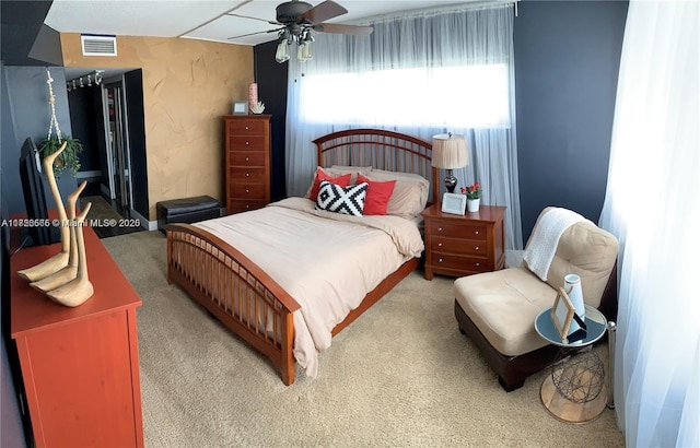 bedroom featuring carpet flooring and ceiling fan