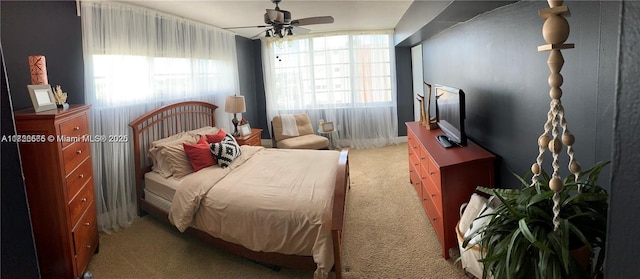 bedroom featuring carpet floors and ceiling fan