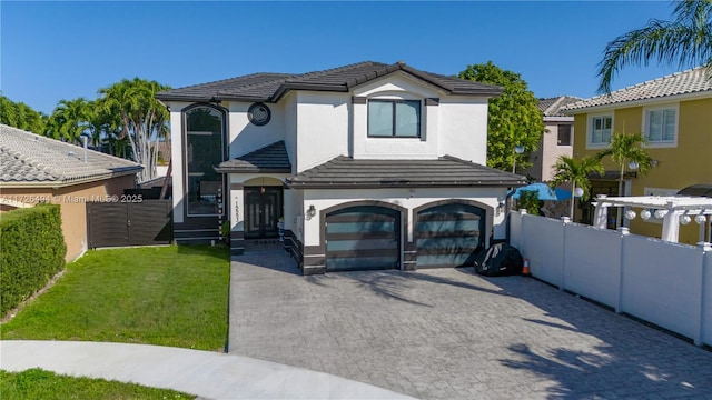 view of front facade with a front lawn and a garage