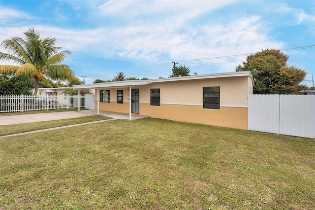 ranch-style home with a front yard