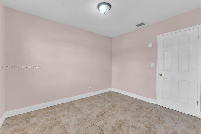 view of tiled spare room