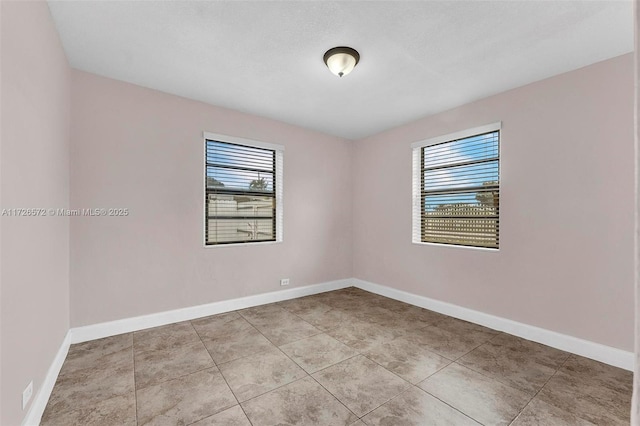 view of tiled empty room