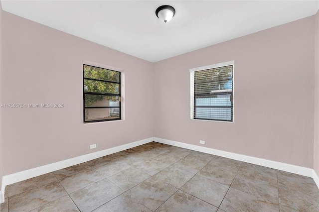 view of tiled spare room