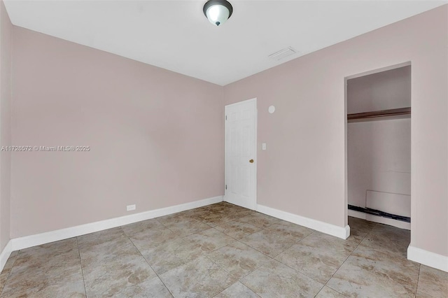 unfurnished bedroom featuring a closet