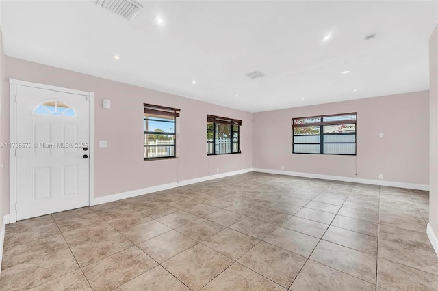 entrance foyer featuring light tile patterned floors