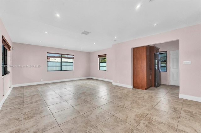 view of tiled spare room