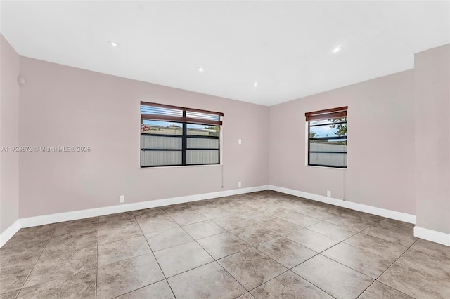 view of tiled spare room