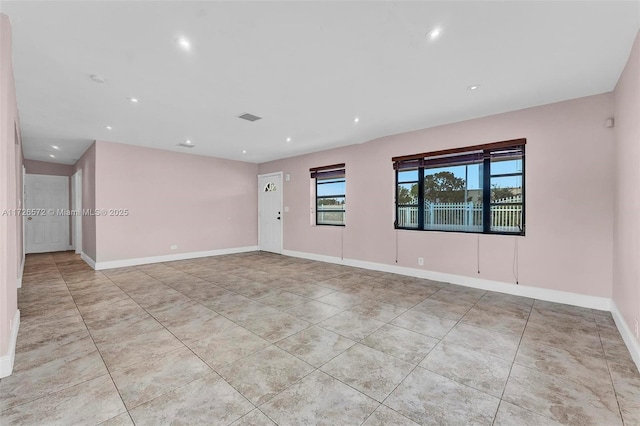 view of tiled spare room