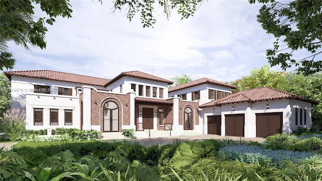 mediterranean / spanish-style home with a garage