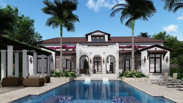 rear view of property with french doors, stucco siding, a patio area, a tiled roof, and stone siding