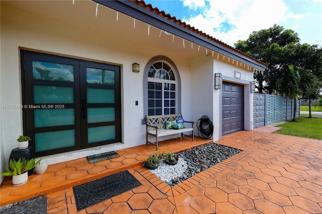 property entrance with a garage