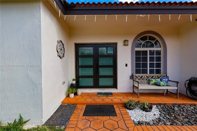 view of exterior entry with french doors