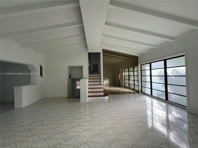 unfurnished living room with vaulted ceiling with beams