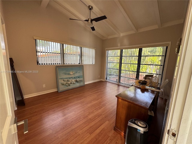 interior space featuring ceiling fan, hardwood / wood-style floors, and lofted ceiling with beams