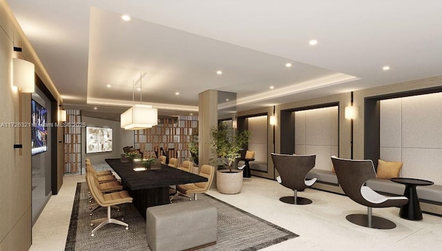 dining area featuring a tray ceiling