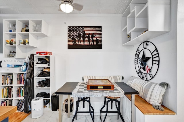 dining space featuring light tile patterned flooring