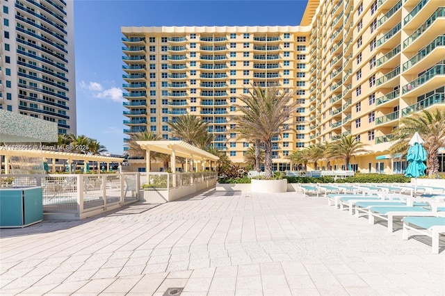 view of property's community with a patio area