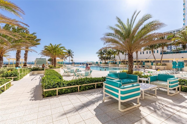 view of patio / terrace featuring a community pool