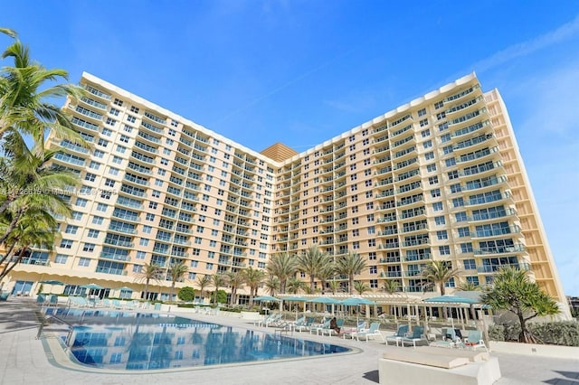 view of swimming pool featuring a patio