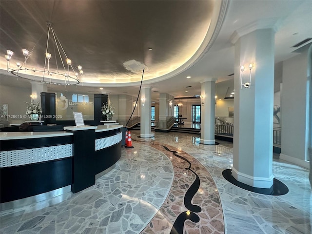 reception area featuring decorative columns