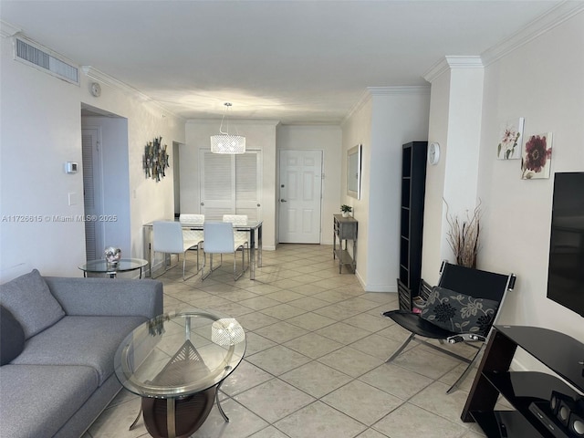 tiled living room featuring an inviting chandelier and ornamental molding