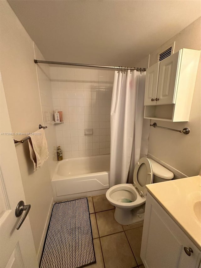 full bathroom with toilet, shower / bathtub combination with curtain, tile patterned floors, and vanity