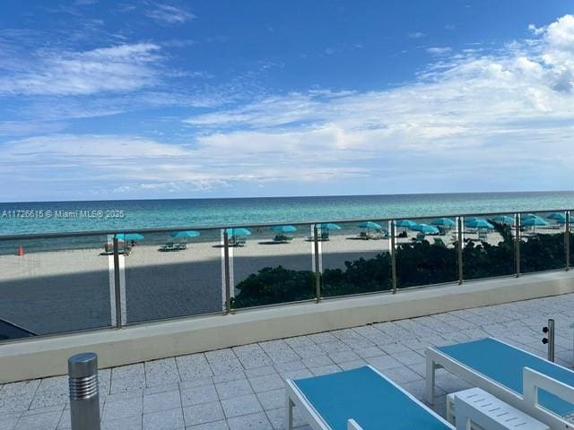 property view of water featuring a view of the beach