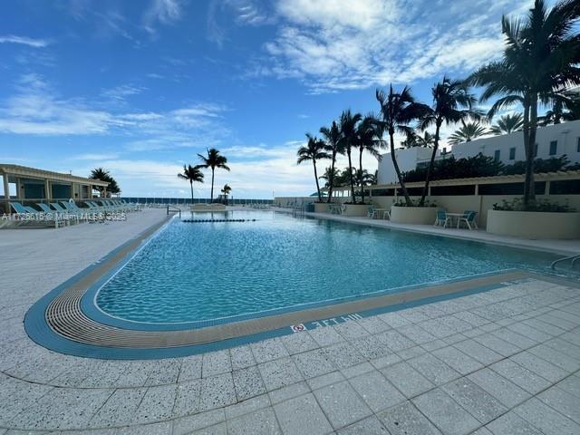 view of pool with a patio area