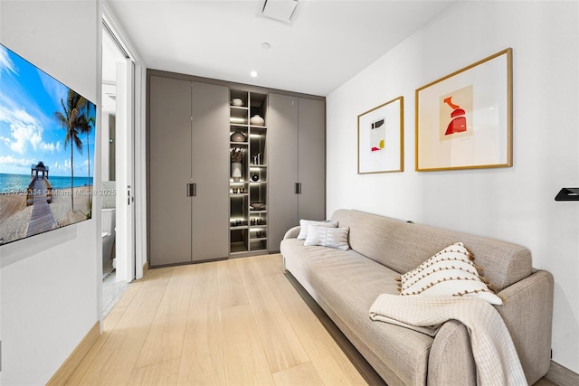 living room with light hardwood / wood-style floors