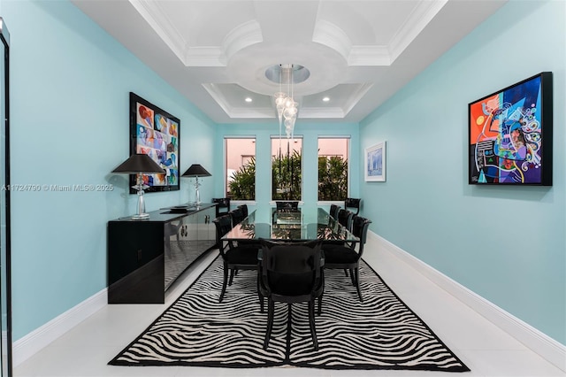 dining room featuring ornamental molding and coffered ceiling