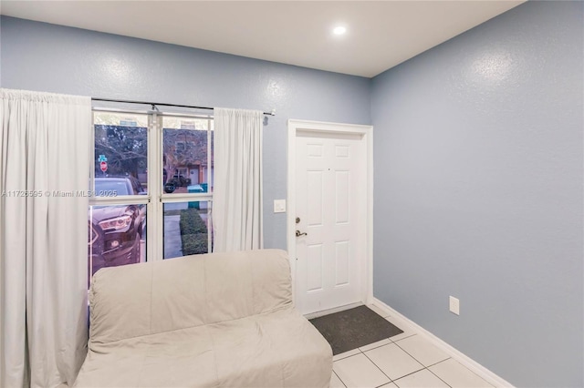 entrance foyer featuring light tile patterned floors