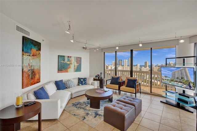 2000 Island Blvd Unit 2802, Aventura, FL 33160 - living area featuring tile patterned floors, track lighting, and visible vents