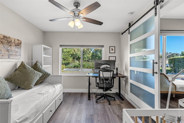 home office featuring ceiling fan and hardwood / wood-style flooring