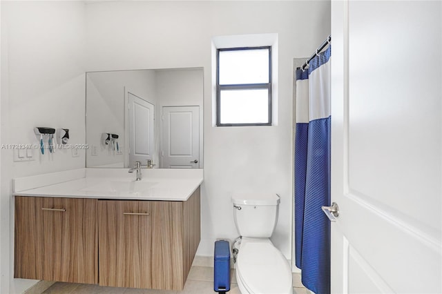 bathroom with toilet, tile patterned flooring, a shower with curtain, and vanity