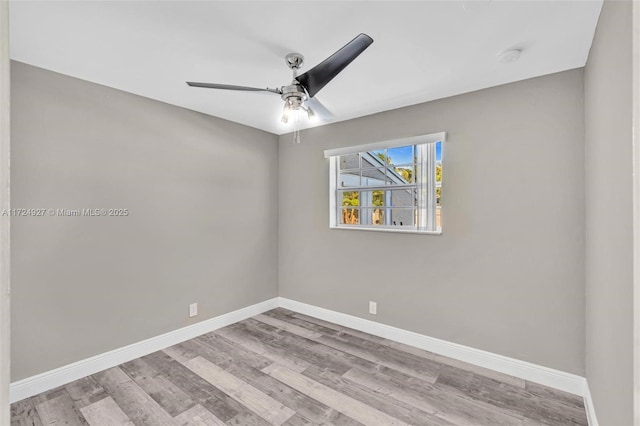 unfurnished room featuring ceiling fan and light wood-type flooring