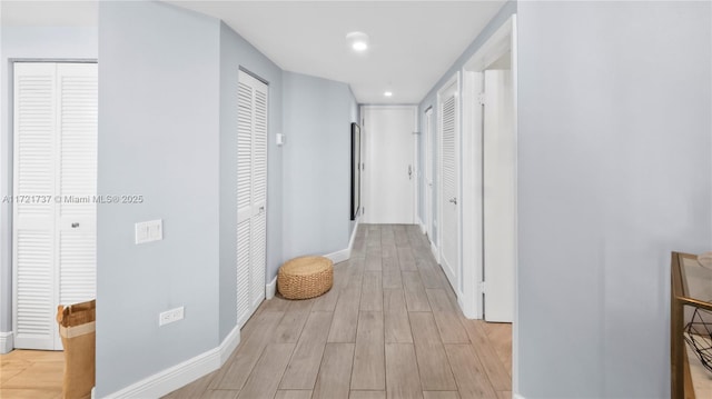 hallway featuring light hardwood / wood-style floors