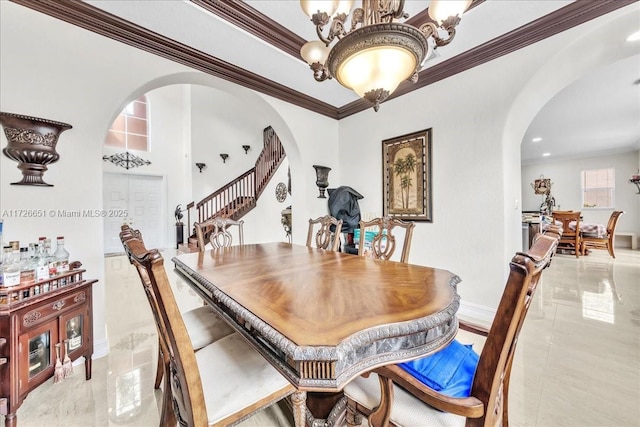 dining area featuring ornamental molding