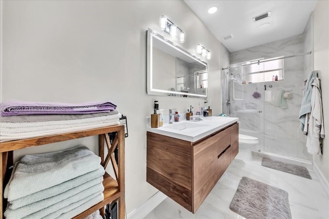 bathroom featuring walk in shower, vanity, and toilet