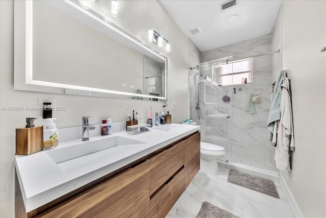 bathroom featuring toilet, an enclosed shower, and vanity