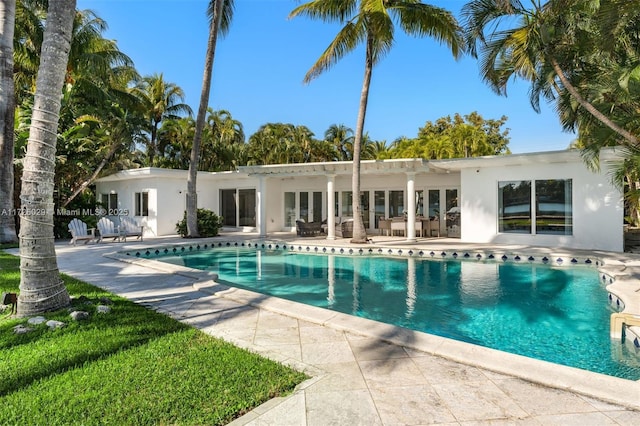 view of swimming pool featuring a patio