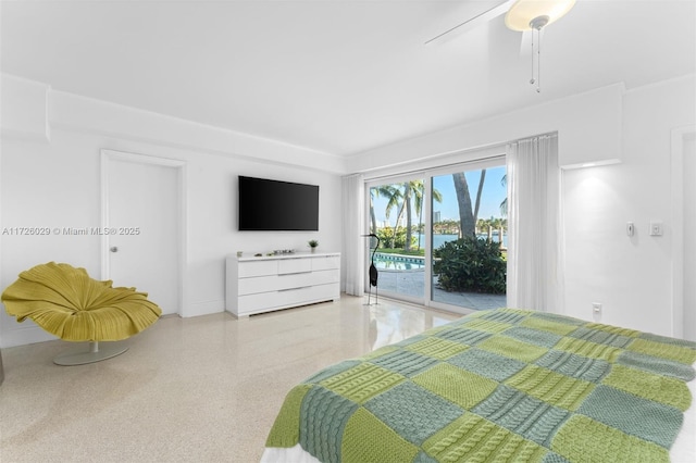 bedroom featuring ceiling fan and access to exterior