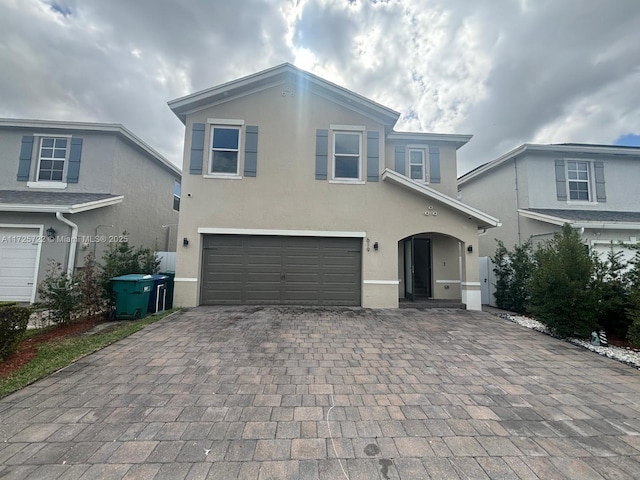 front of property with a garage