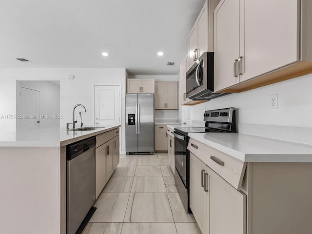 kitchen featuring appliances with stainless steel finishes and sink