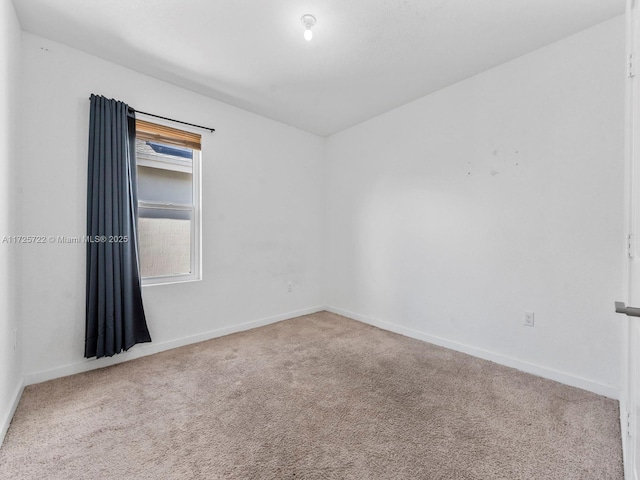 view of carpeted spare room