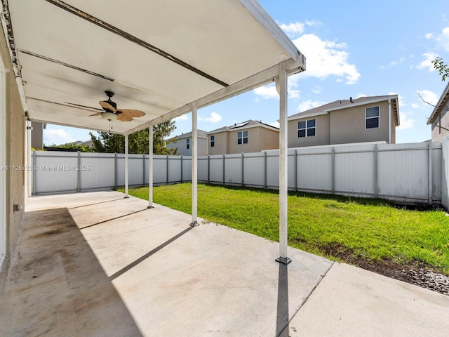 view of patio featuring ceiling fan