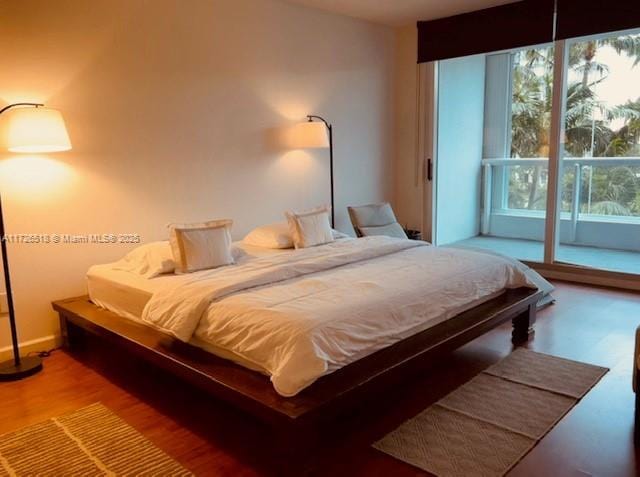 bedroom featuring hardwood / wood-style flooring