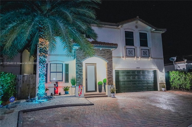 view of front of home with a garage