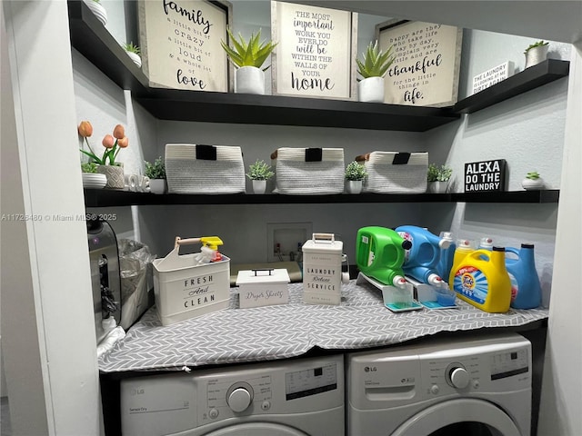 washroom featuring washer and clothes dryer