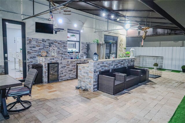 kitchen featuring stainless steel fridge